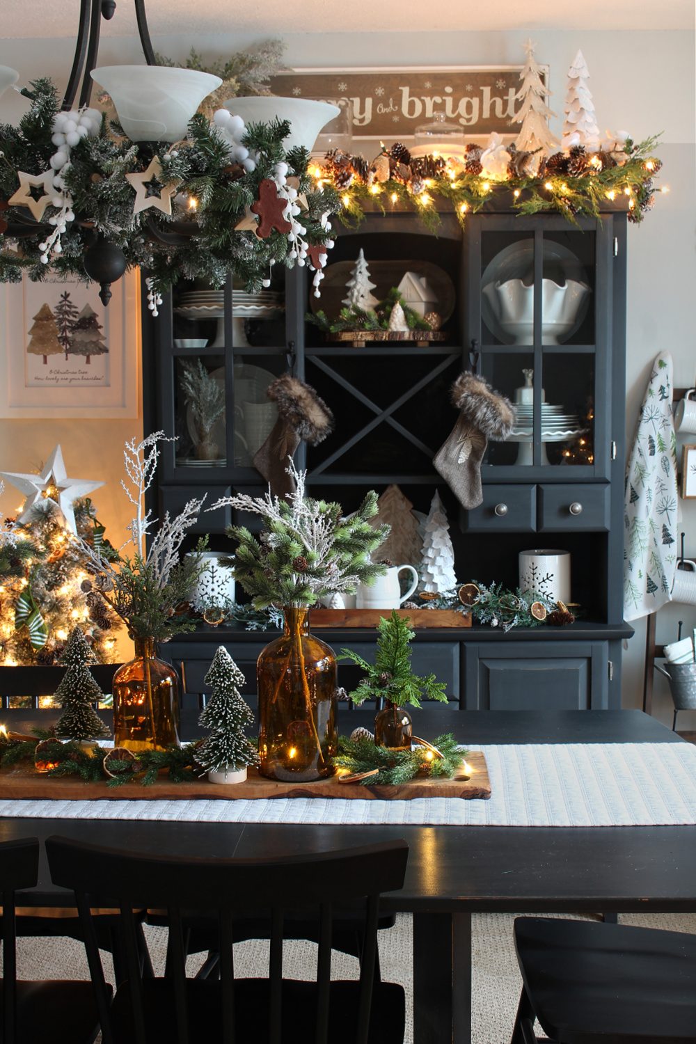 Farmhouse Dining Room with a Decorated Dark Grey Hutch — Christmas Dining Room Decor