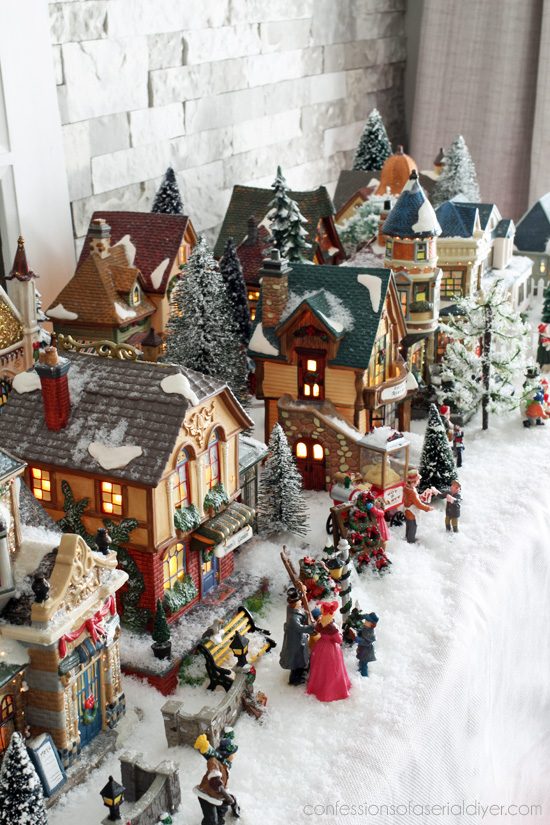 Lively Traditional Village with Numerous Figures Lively Traditional Village with Numerous Figures — Christmas Village Display