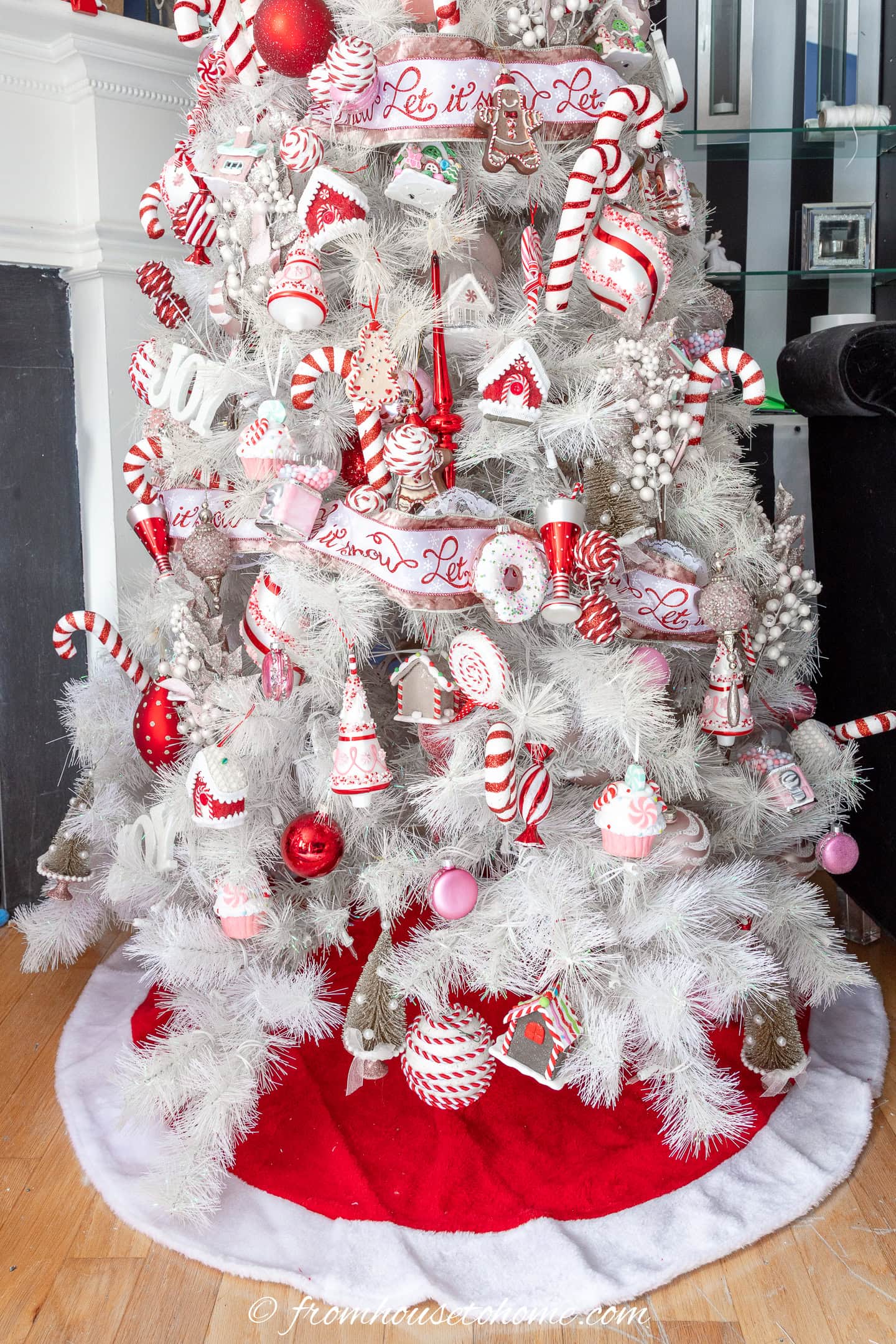 White Christmas Tree Adorned with Candy Cane Ornaments — Candy Cane Christmas Decor