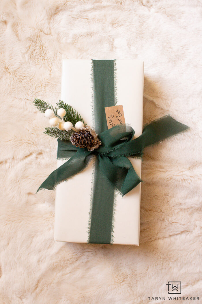 Sophisticated Cream Gift with Frayed Green Ribbon and Pinecone — Christmas Gift Wrapping