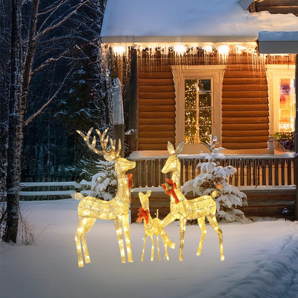 Illuminated Reindeer Family on a Snowy Lawn — Christmas Light Display Ideas