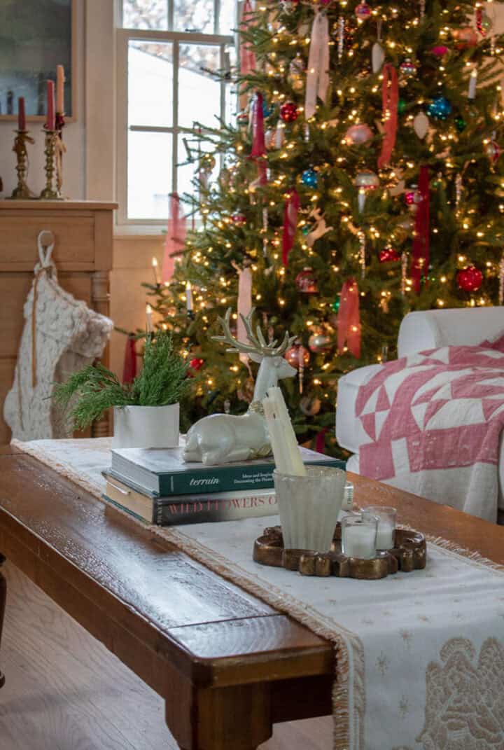 Cozy Coffee Table Vignette with Deer Figurine and Christmas Tree Cozy Coffee Table Vignette with Deer Figurine and Christmas Tree — Christmas Living Room Decor