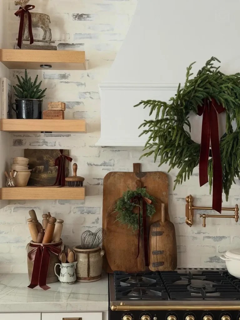 Rustic Stovetop Wall Decor with Evergreen Wreath and Rolling Pins — Christmas Kitchen Decor