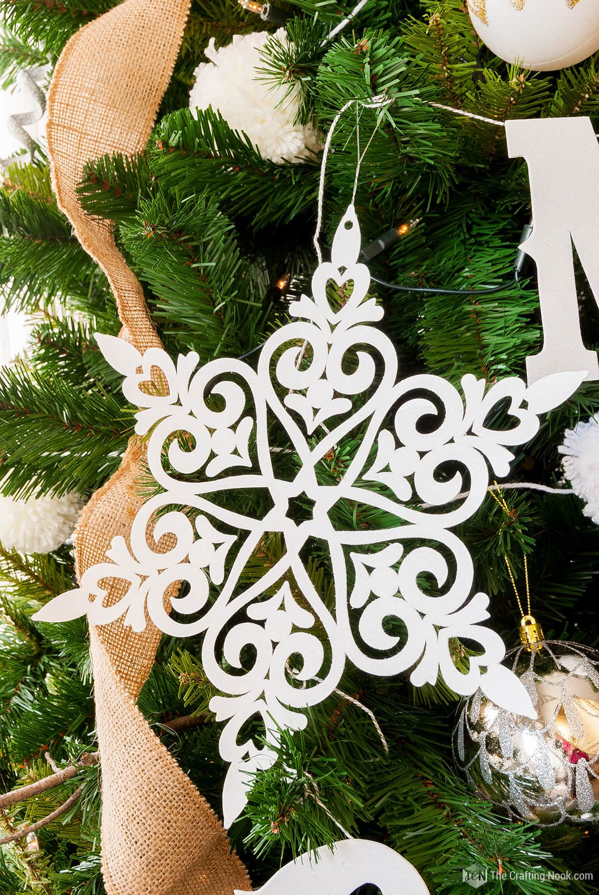 DIY Glittered Snowflake Paper Ornaments - The Crafting Nook
