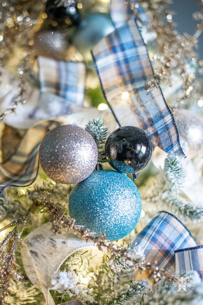 Cozy Christmas Tree with Blue Glitter and Plaid Accents Cozy Christmas Tree with Blue Glitter and Plaid Accents — Blue Christmas Decor