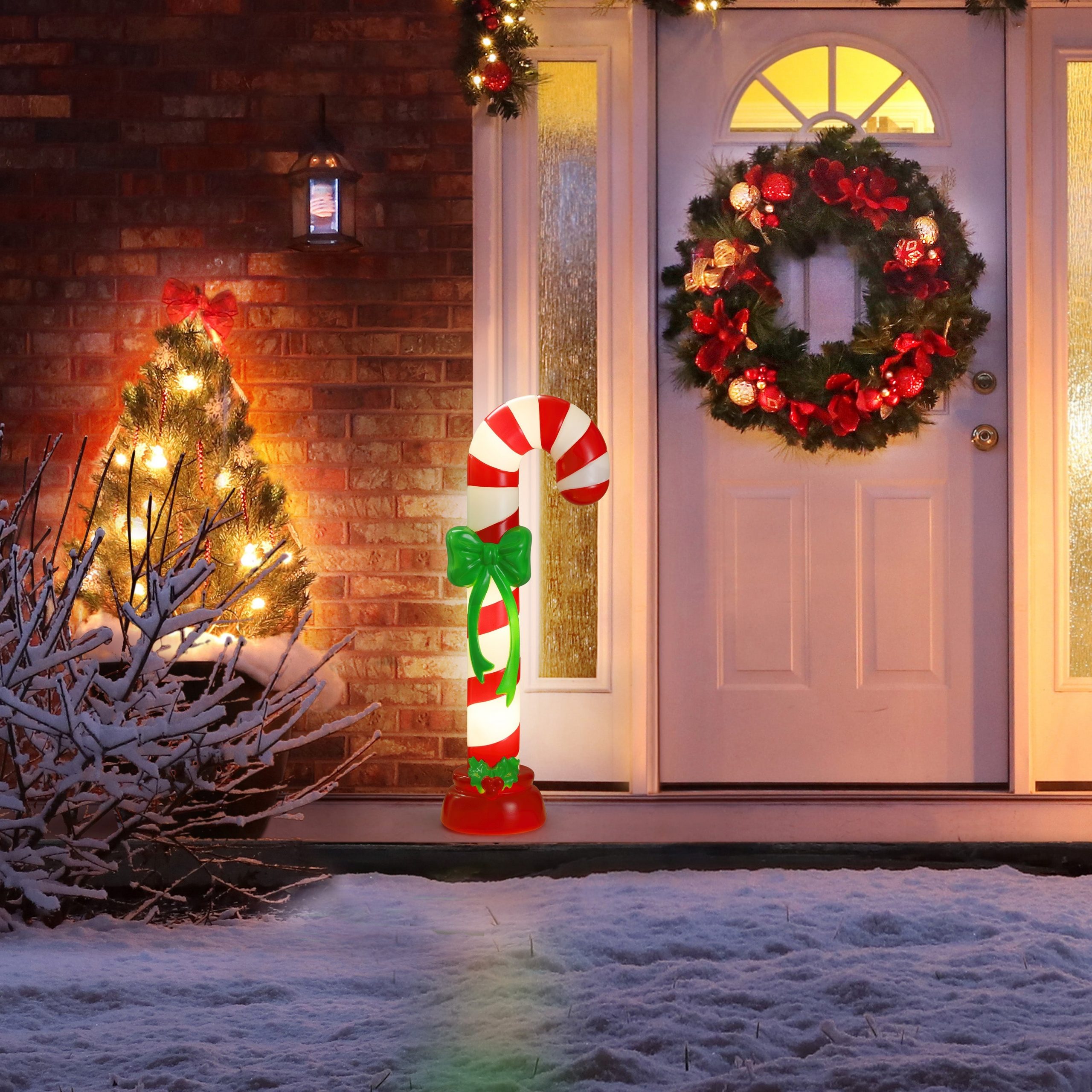 Festive Porch with Blow Mold Candy Cane and Tree — Candy Cane Christmas Decor