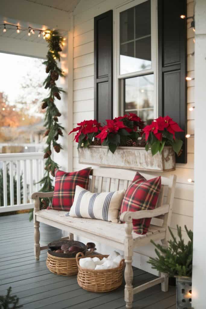 Wooden Bench with Festive Pillows and Poinsettias in Window Box — Farmhouse Christmas Porch