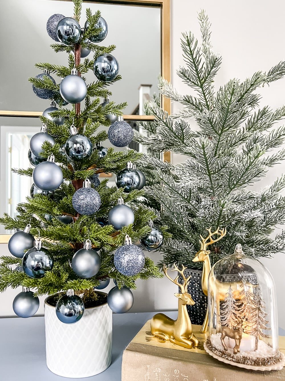 Modern Minimalist Display with Two Small Trees and Reindeer — Small Christmas Tree Decor