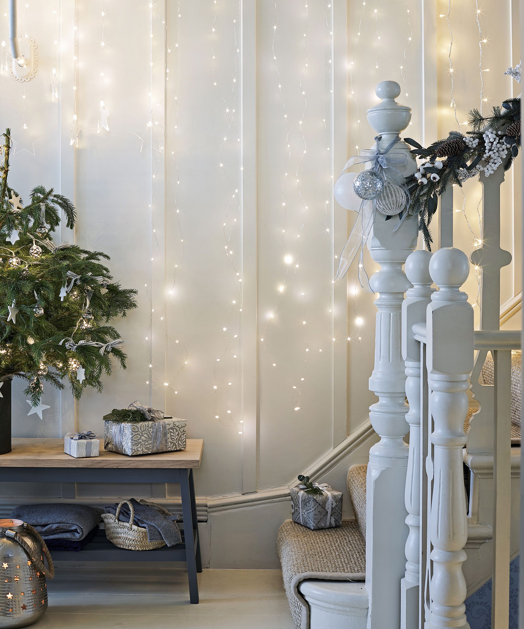 Cascading String Lights in Entryway Cascading String Lights in Entryway — Christmas Wall Decor