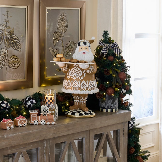 Whimsical Display Cabinet with Gingerbread Santa Figurine — Gingerbread Christmas Decor