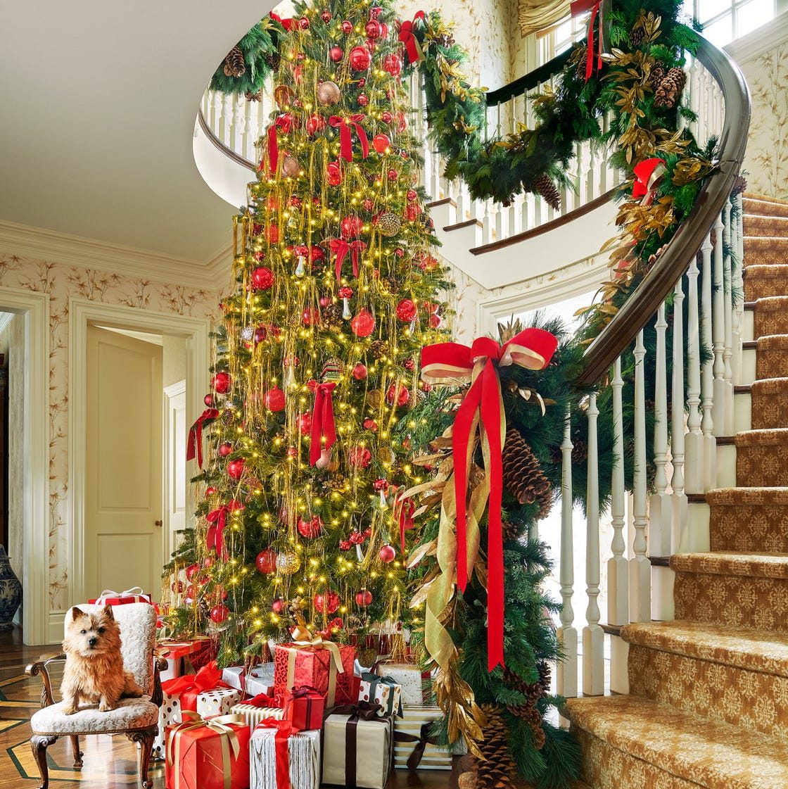 Grand Traditional Entryway with Towering Christmas Tree and Garland Grand Traditional Entryway with Towering Christmas Tree and Garland — christmas decor trends 2026