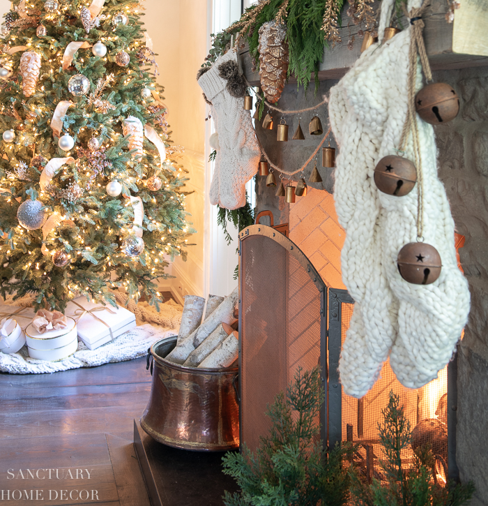 Cozy Farmhouse Fireplace with Knit Stockings and Copper Bucket — Farmhouse Christmas Decor