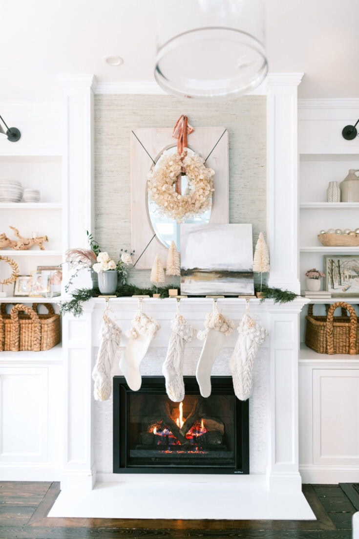 Cozy Fireplace with Fluffy White Stockings and Neutral Wreath Cozy Fireplace with Fluffy White Stockings and Neutral Wreath — White Christmas Decor