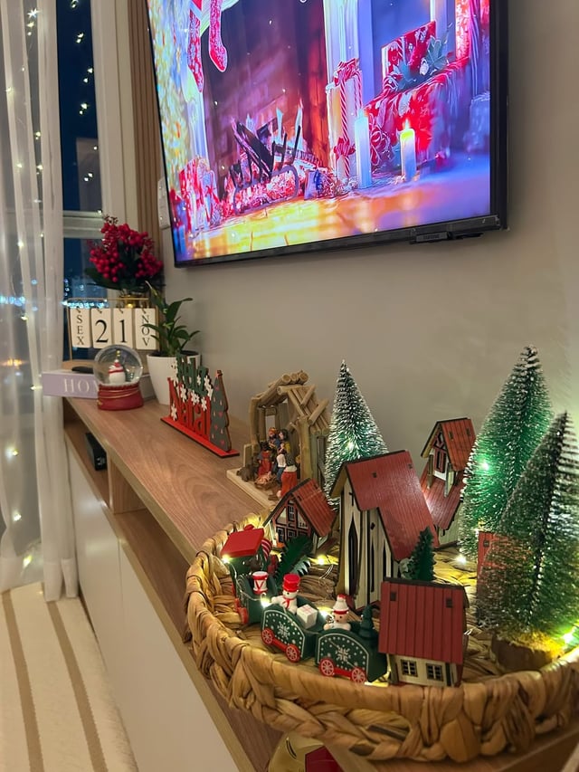 Detailed Miniature Christmas Village Display on a Shelf Detailed Miniature Christmas Village Display on a Shelf — Christmas Apartment Decor