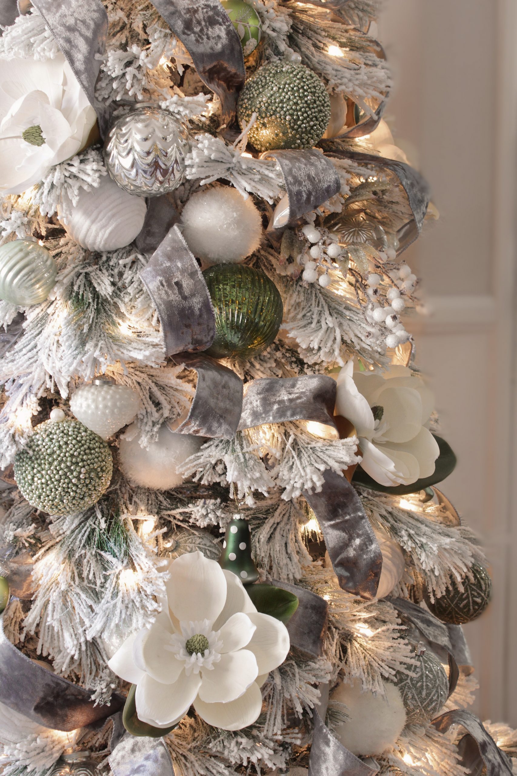Close-Up on a Sage Green Christmas Tree with Velvet Ribbon Close-Up on a Sage Green Christmas Tree with Velvet Ribbon — Sage Green Christmas Decor