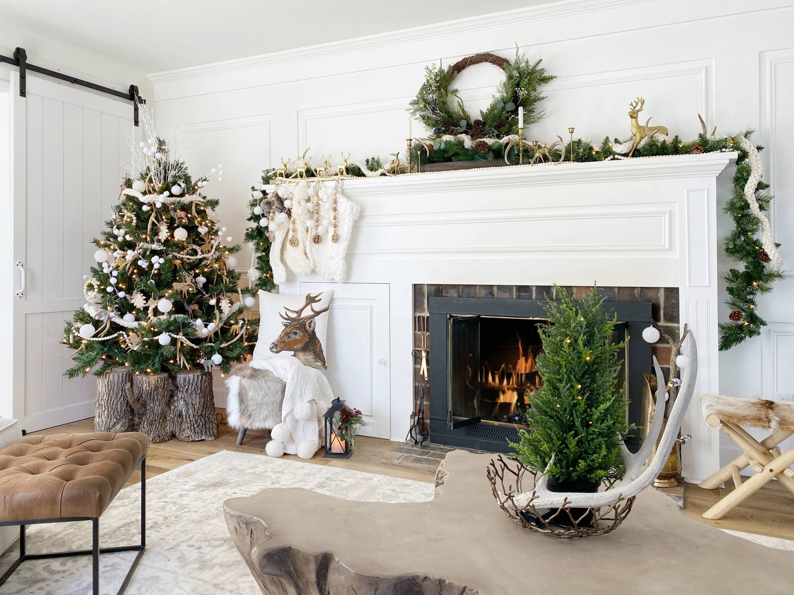 Farmhouse Christmas Fireplace with Flocked Tree and Deer Figures Farmhouse Christmas Fireplace with Flocked Tree and Deer Figures — Christmas Fireplace Decor