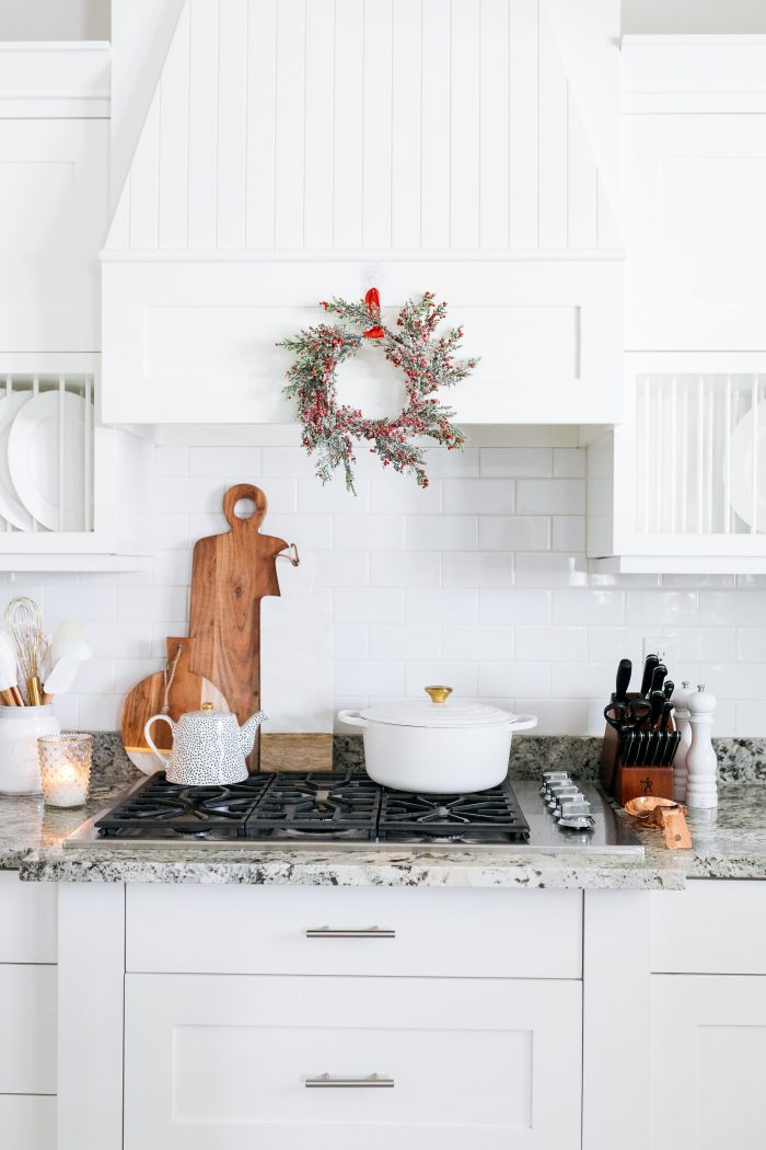 Modern Farmhouse Stove Area with Frosted Berry Wreath and Teapot — Christmas Kitchen Decor