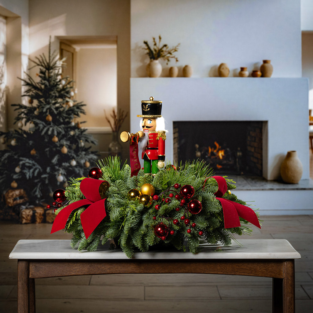 Nutcracker Bugler in a Lush Evergreen Centerpiece Nutcracker Bugler in a Lush Evergreen Centerpiece — Nutcracker Christmas Decor