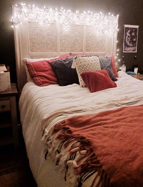 Maximalist Bedroom with Twinkling Fairy Lights on a White Headboard — Christmas Fairy Lights Headboard