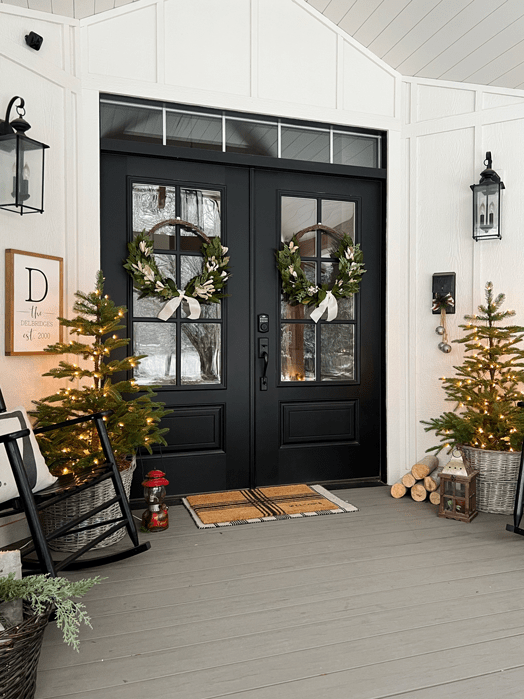 Elegant Black Double Doors with Wreaths and Symmetrical Trees — Farmhouse Christmas Porch
