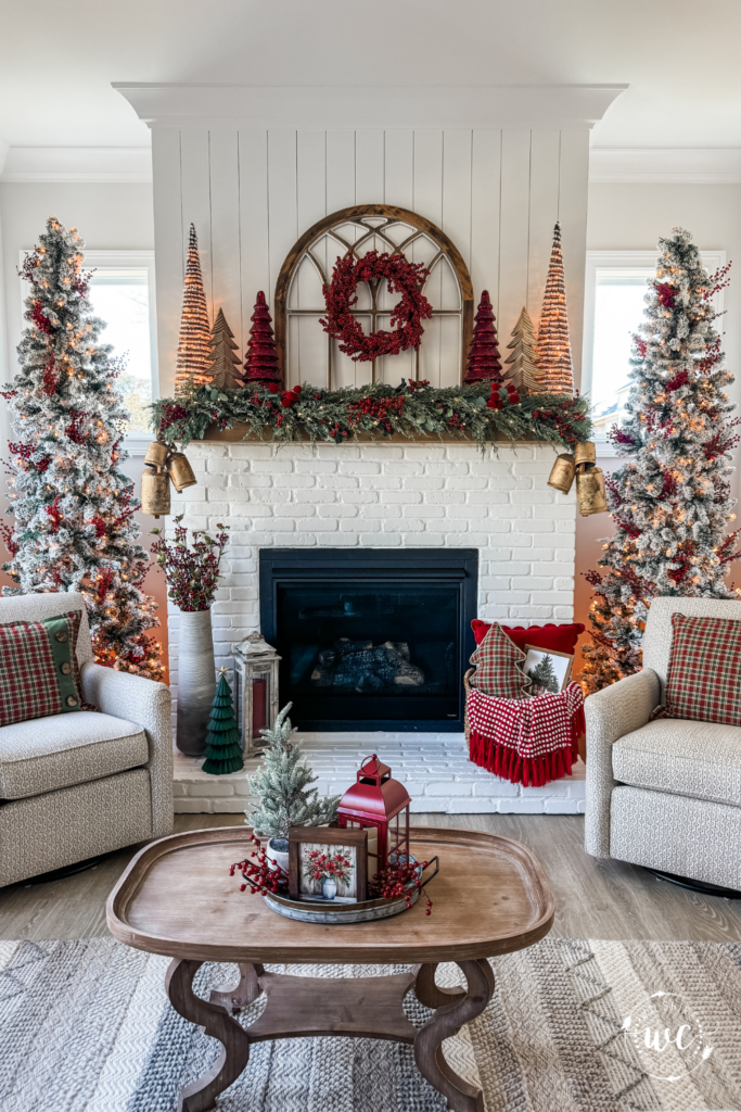 Traditional Living Room with Flocked Christmas Trees and Decorated Fireplace Mantel — Traditional Christmas Decor