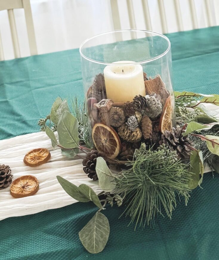 Natural Centerpiece with Large Candle and Dried Oranges — Christmas Centerpiece