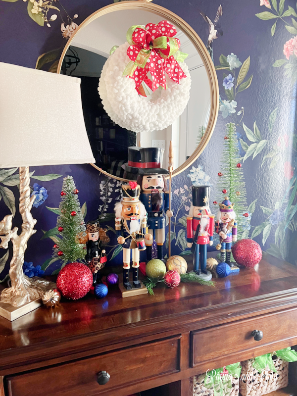 Collection of Nutcrackers on a Console Table Display Collection of Nutcrackers on a Console Table Display — Nutcracker Christmas Decor