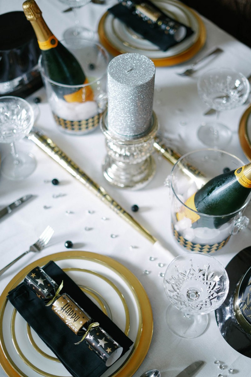 Festive New Year's Eve Table Setting with Celebratory Accessories Festive New Year's Eve Table Setting with Celebratory Accessories — New Years Eve Table Decor