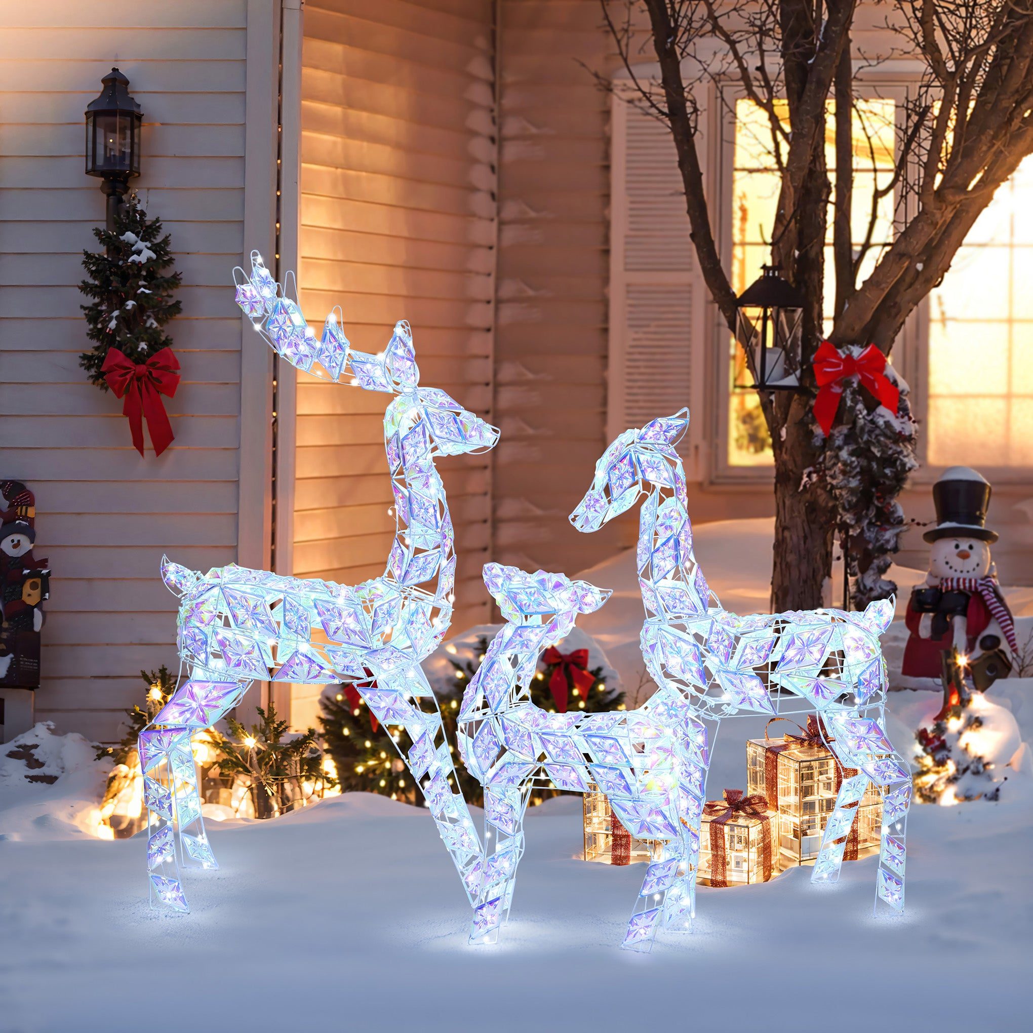 Illuminated Reindeer Display in Snowy Yard — Christmas Light Display Ideas