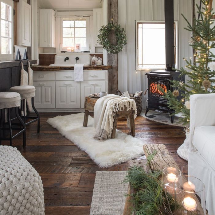 Rustic Cabin with Wood Stove and Decorated Christmas Tree Rustic Cabin with Wood Stove and Decorated Christmas Tree — Cozy Christmas Decor