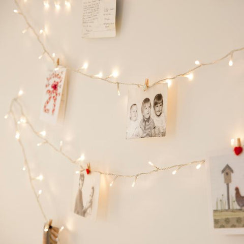 Warm White Beige Minimalist Wall Display with Horizontal Fairy Lights and Photos Warm White Beige Minimalist Wall Display with Horizontal Fairy Lights and Photos — Christmas Fairy Lights Wall