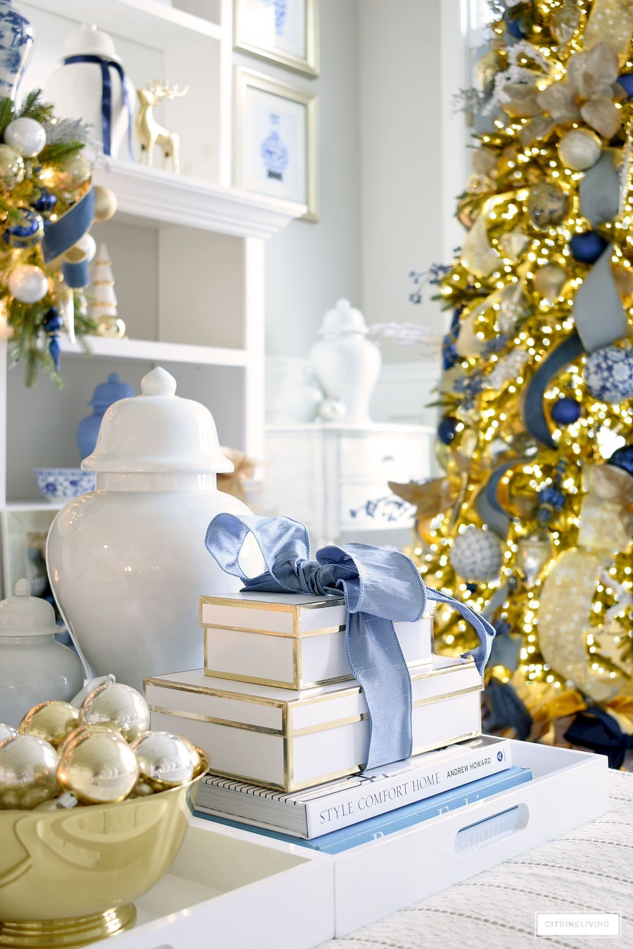 Blue and Gold Christmas Decor Vignette with Stacked Gifts Blue and Gold Christmas Decor Vignette with Stacked Gifts — Blue Christmas Decor