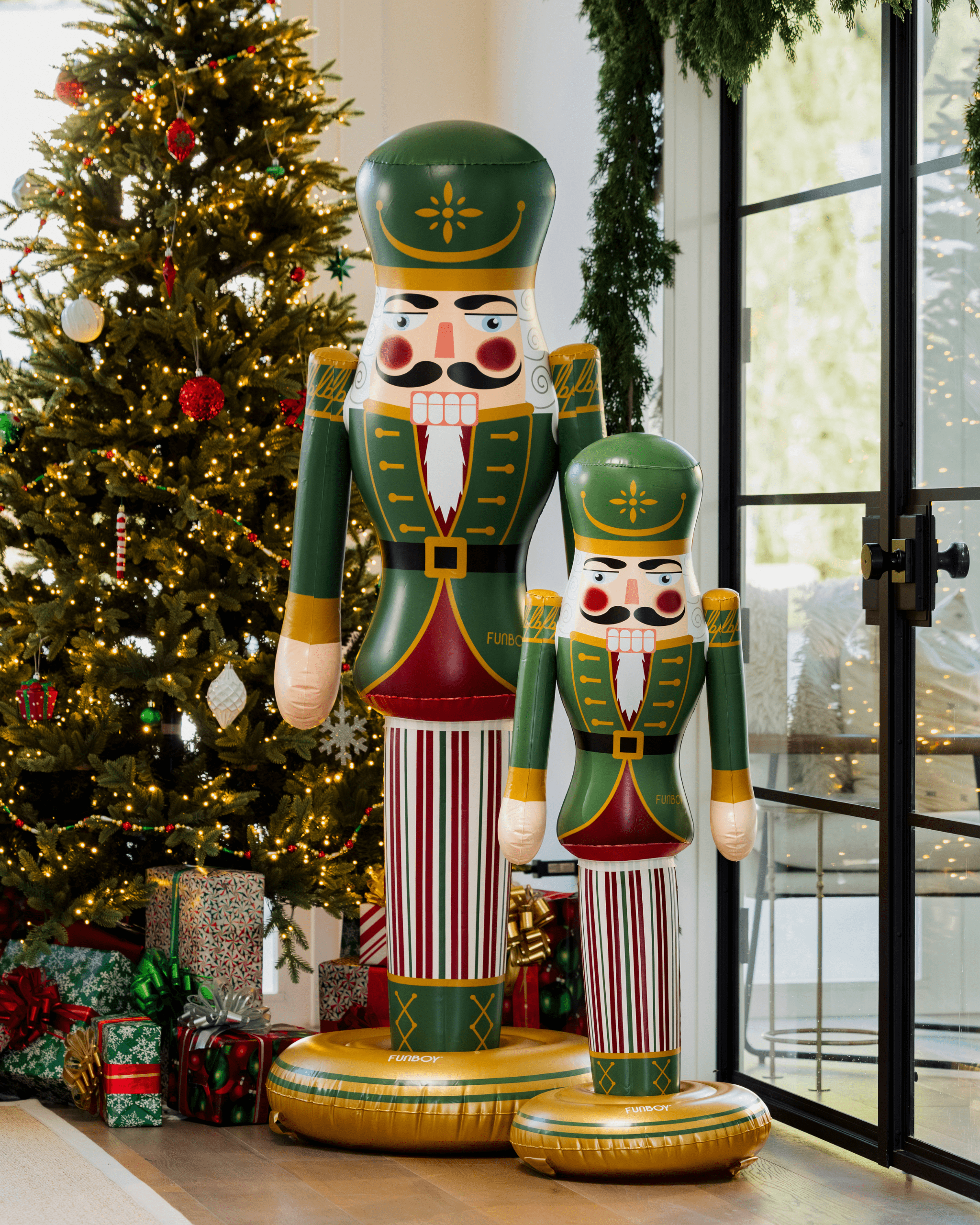 Inflatable Nutcrackers by a Brightly Lit Christmas Tree Inflatable Nutcrackers by a Brightly Lit Christmas Tree — Nutcracker Christmas Decor