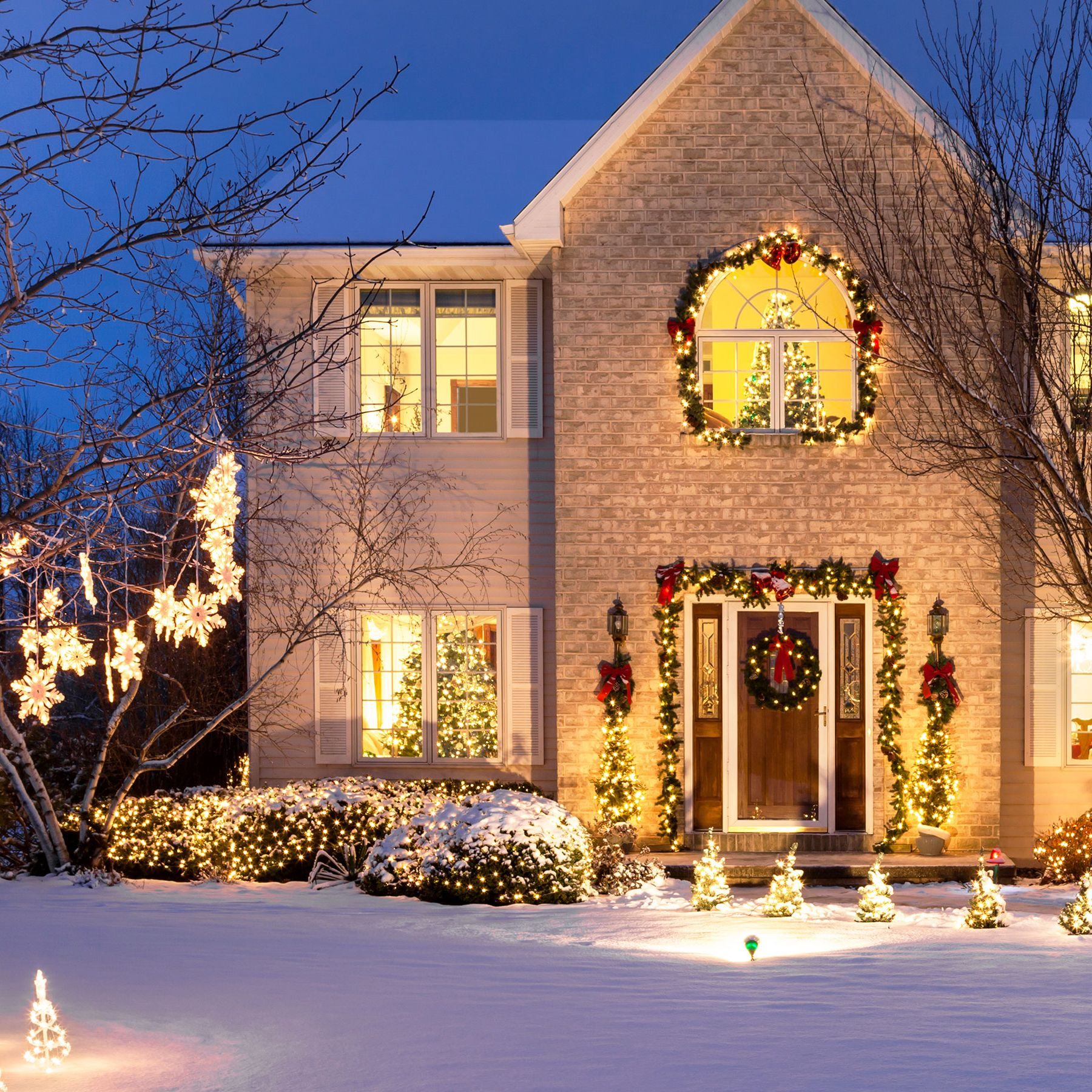 Classic Brick House with Icicle and Pathway Lights — Outdoor Christmas Lights