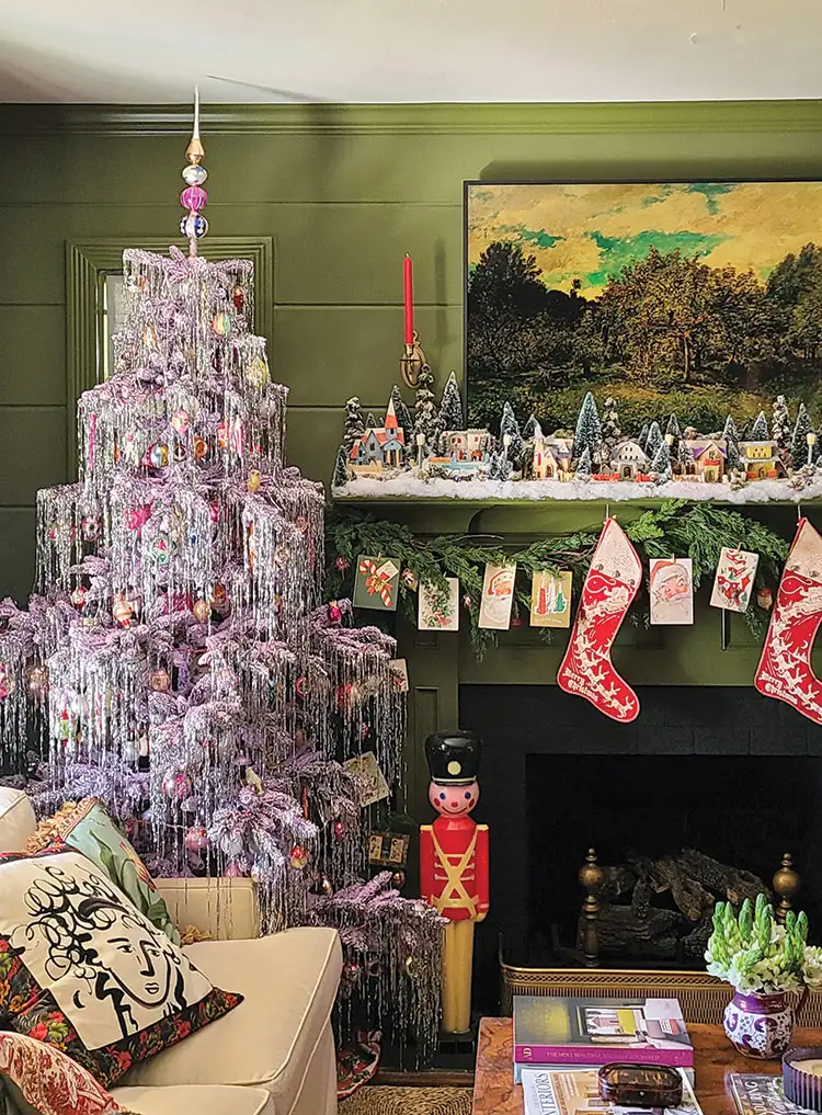 Festive Traditional Village on a Garlanded Mantelpiece Festive Traditional Village on a Garlanded Mantelpiece — Christmas Village Display