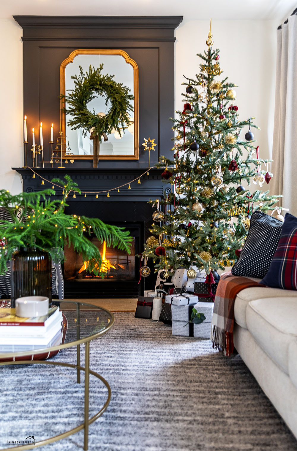 Living Room with a Burgundy and Gold Christmas Tree and Fireplace — Burgundy Christmas Decor