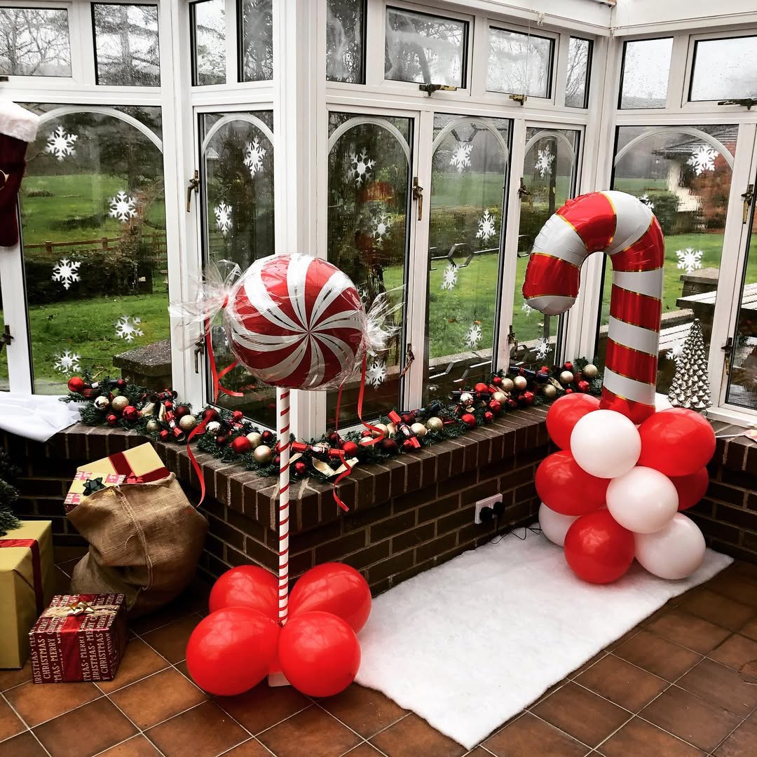 Oversized Candy Cane and Lollipop Conservatory Display — Candy Cane Christmas Decor