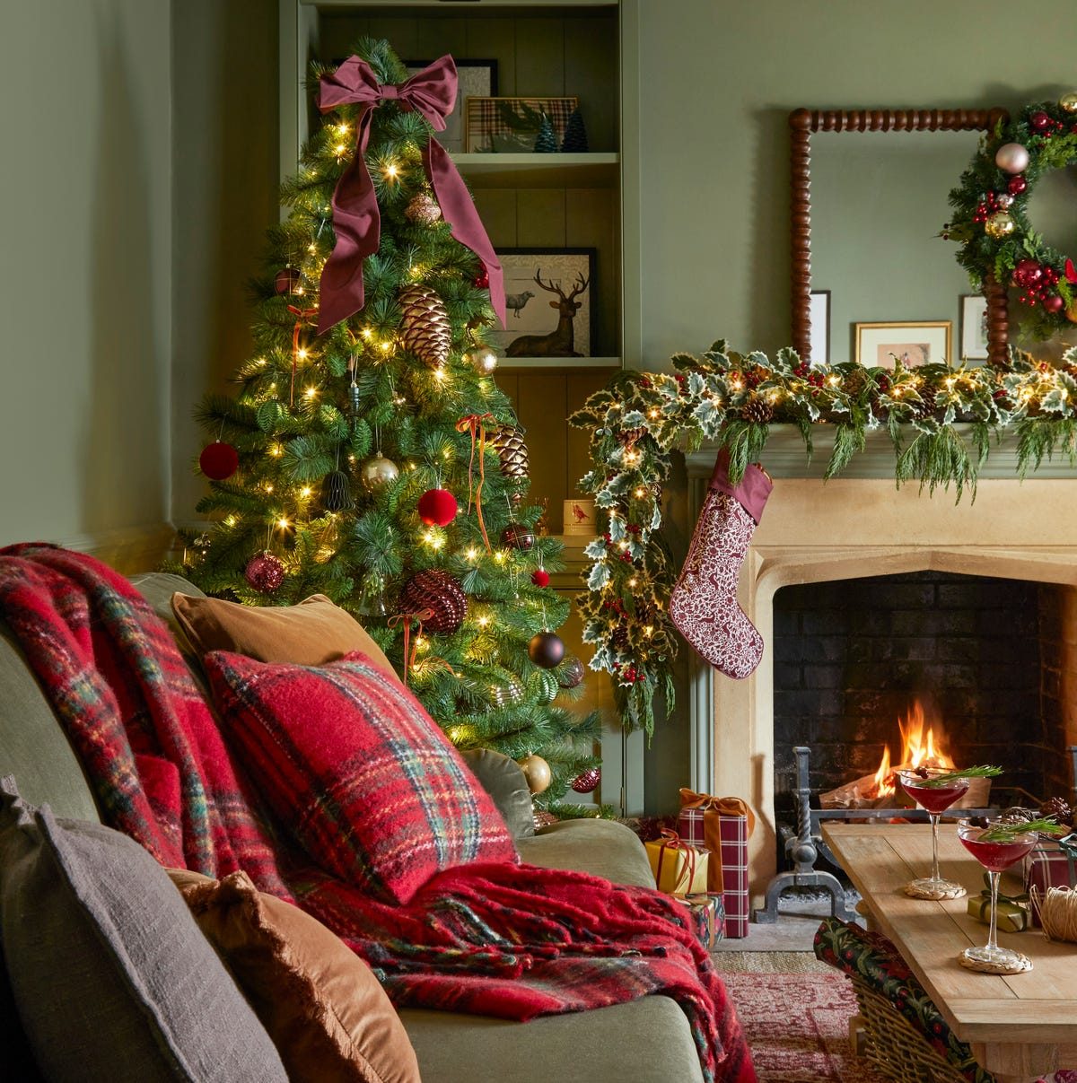 Cozy Living Room with a Glowing Fireplace and Plaid Accents Cozy Living Room with a Glowing Fireplace and Plaid Accents — Red and Green Christmas Decor