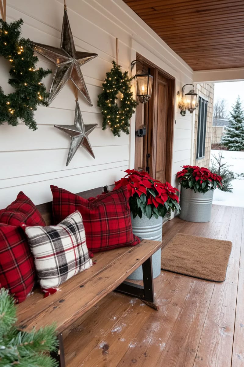 Cozy Farmhouse Porch Seating with Plaid Pillows and Poinsettias — Farmhouse Christmas Decor