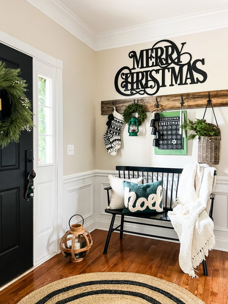 Farmhouse Entryway Decor with Black Bench and Merry Christmas Sign Farmhouse Entryway Decor with Black Bench and Merry Christmas Sign — Christmas Entryway Decor