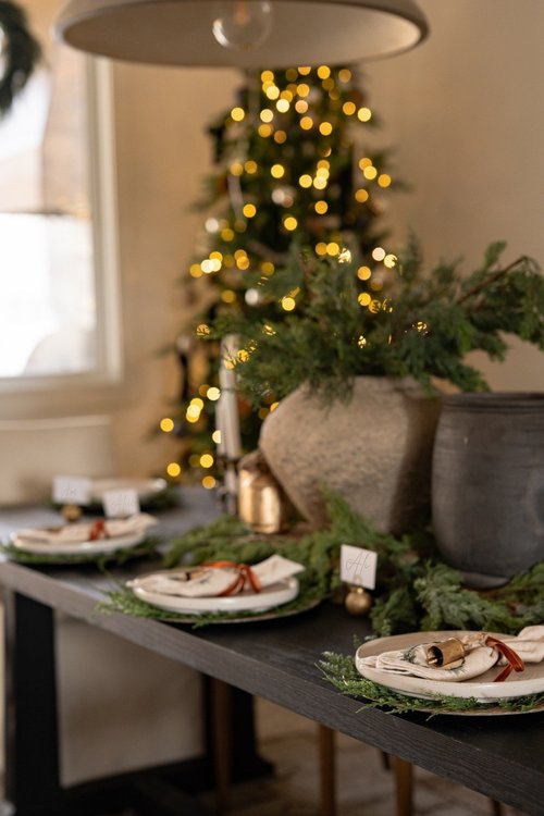Neutral Modern Farmhouse Tablescape with Greenery and Bells — Christmas Dining Room Decor