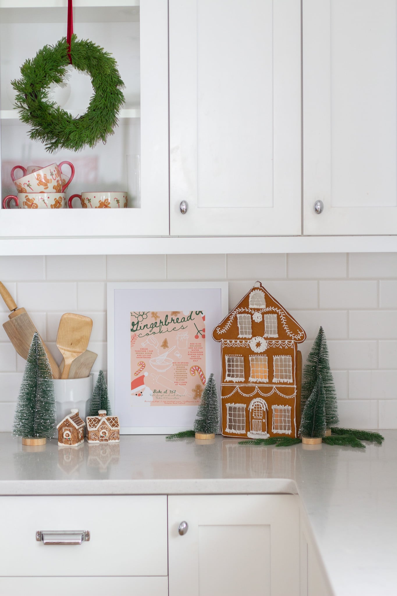 Detail Vignette Farmhouse Kitchen Counter with Gingerbread House and Mini Trees — Gingerbread Christmas Decor