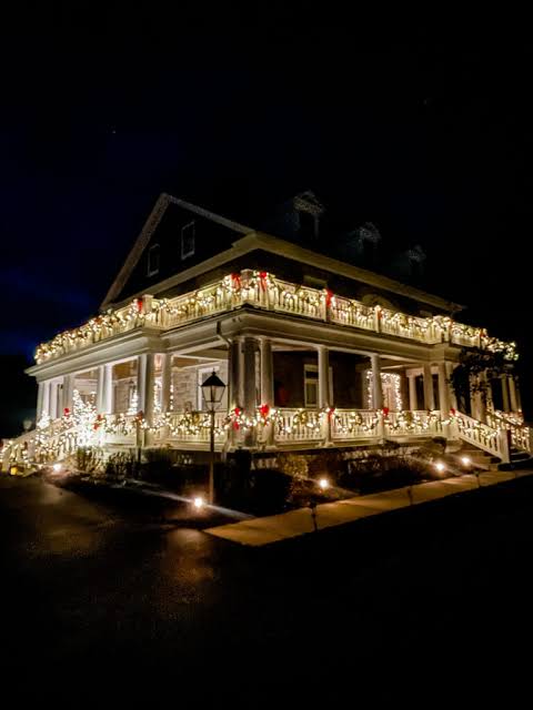 Grand Historic Home Extensively Wrapped in Lights and Garland — Outdoor Christmas Lights