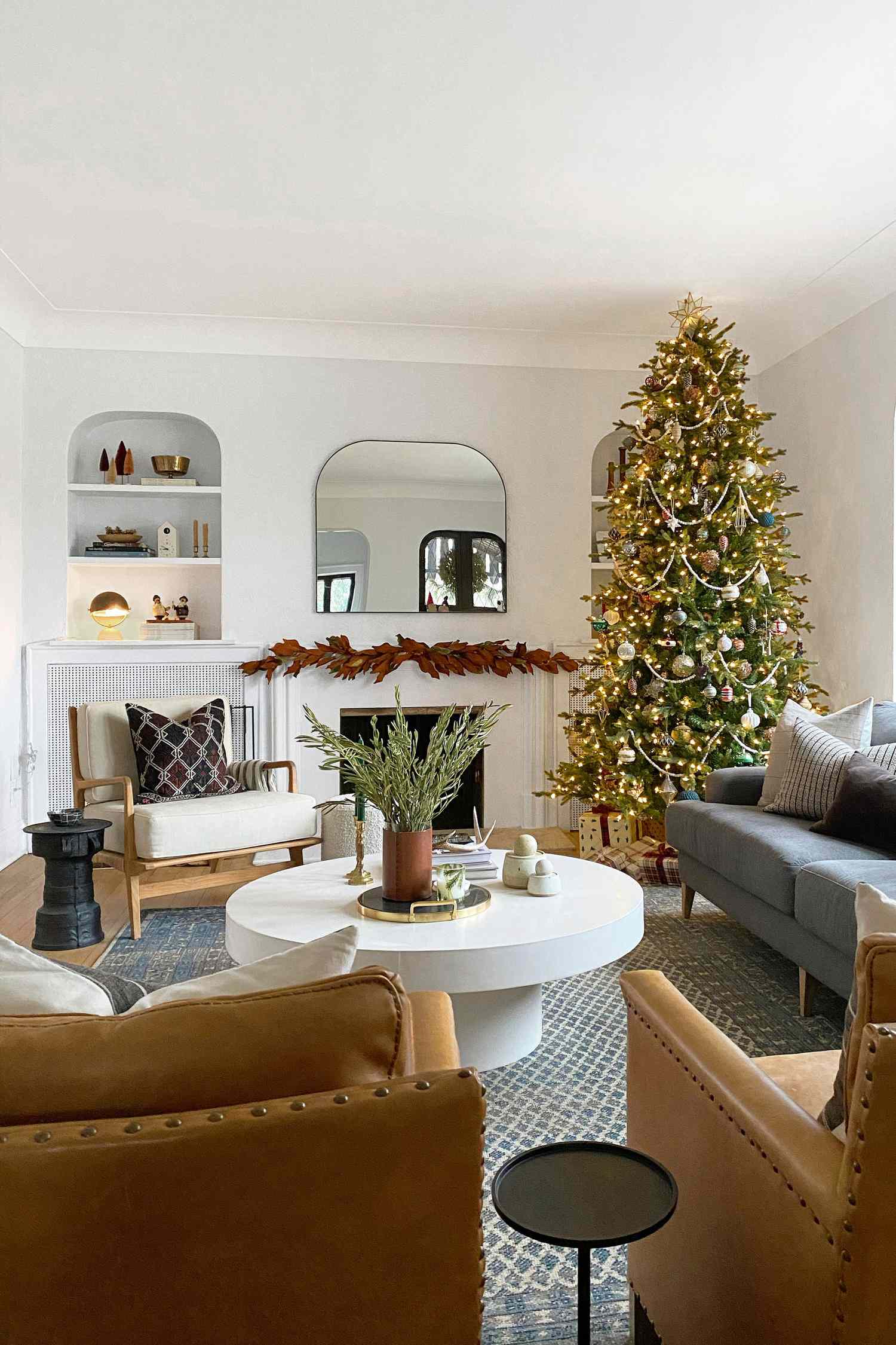 Modern Living Room with a Large, Brightly Lit Christmas Tree Modern Living Room with a Large, Brightly Lit Christmas Tree — Christmas Living Room Decor