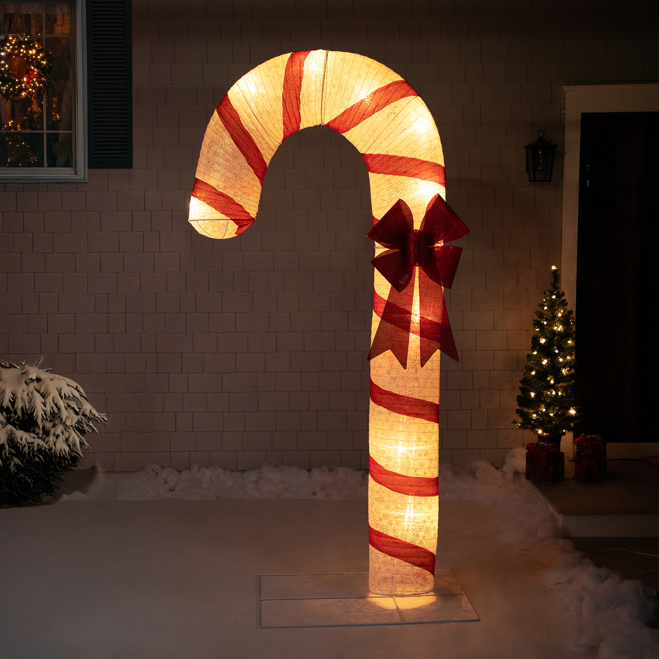 Pre-lit Candy Cane Yard Decoration in Snow — Candy Cane Christmas Decor