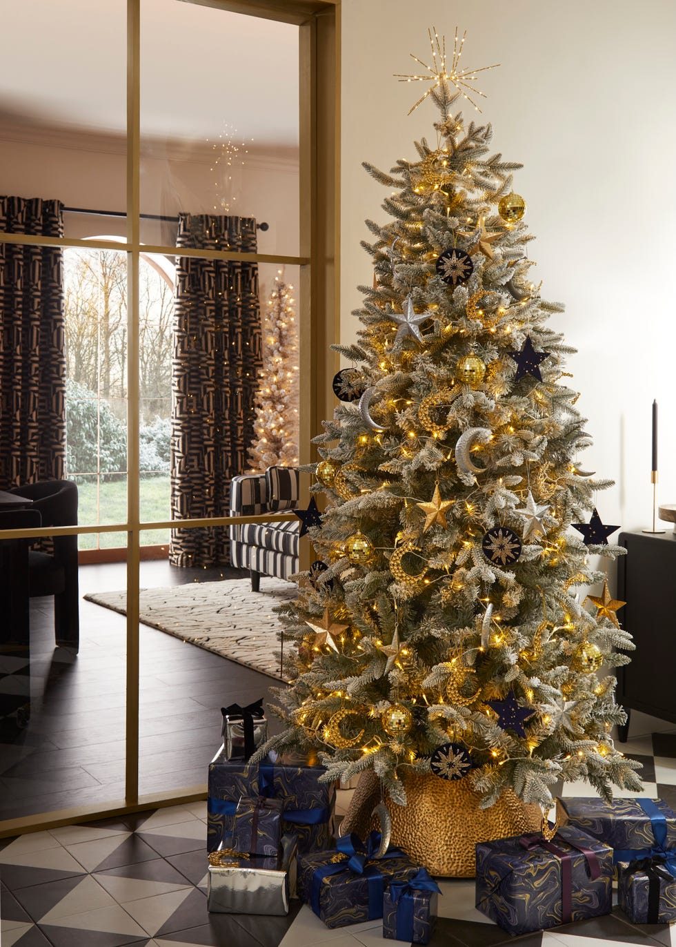 Elegant Frosted Christmas Tree with Starburst Topper — Whimsical Christmas Decor