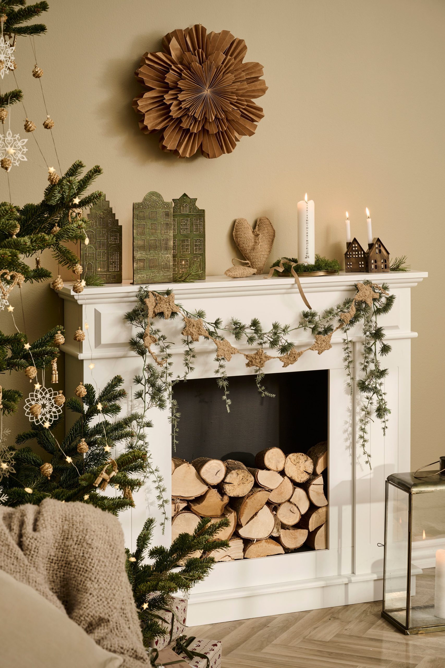 Natural Minimalist Fireplace Mantel with Textured Paper Snowflakes Natural Minimalist Fireplace Mantel with Textured Paper Snowflakes — christmas decor trends 2026