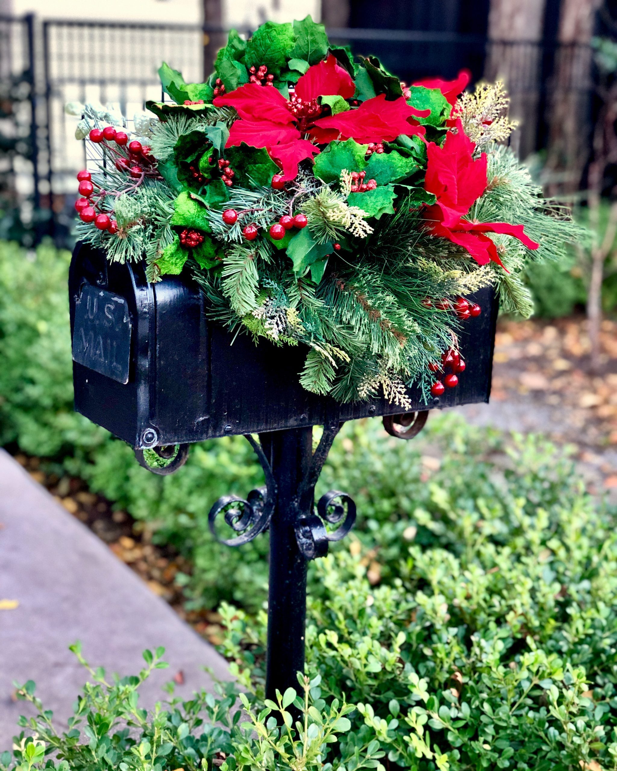 Poinsettia and Berry-Covered Mailbox with Faux Snow Accent — Christmas Mailbox Decor