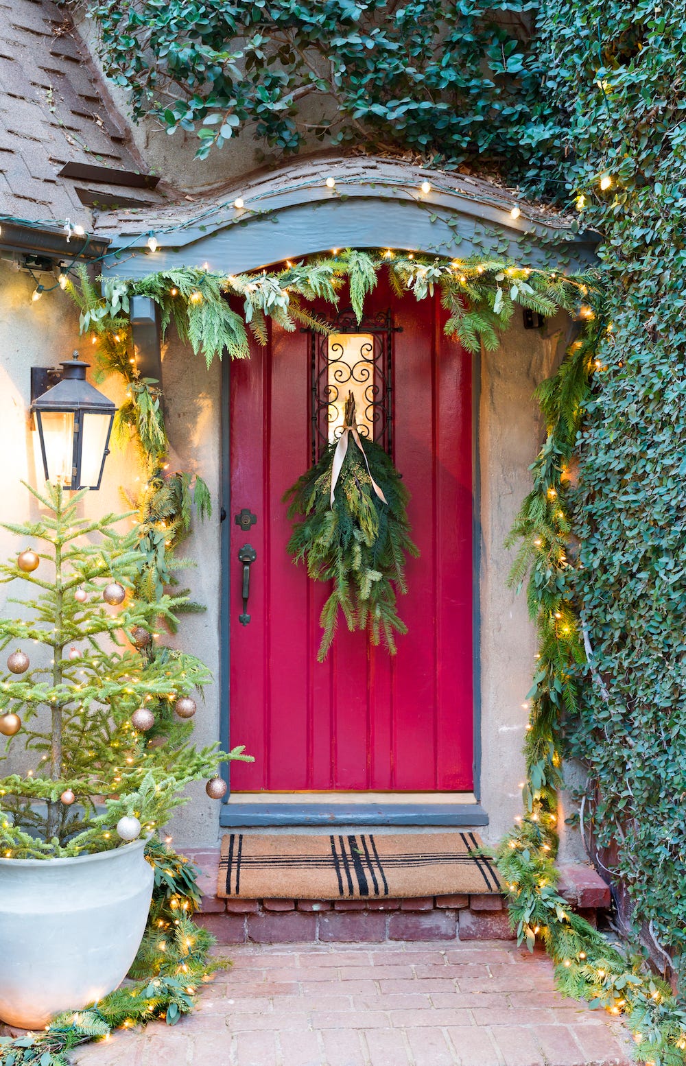 Festive Doorway with Garland and Twinkling Lights — Christmas Yard Decor