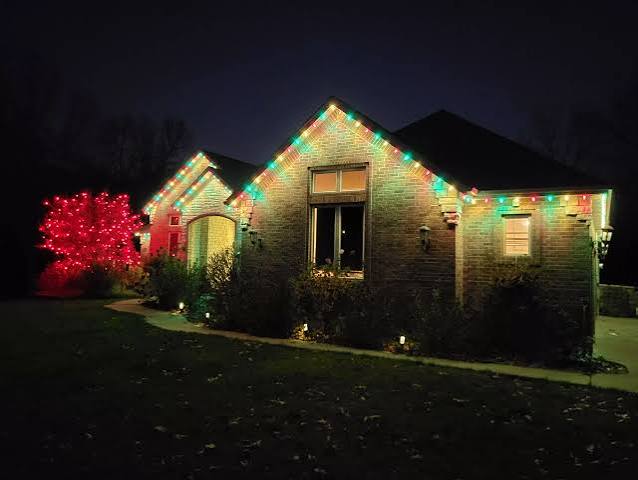 Vibrant Red, Green, and White Roofline Lights — Christmas House Exterior Decor
